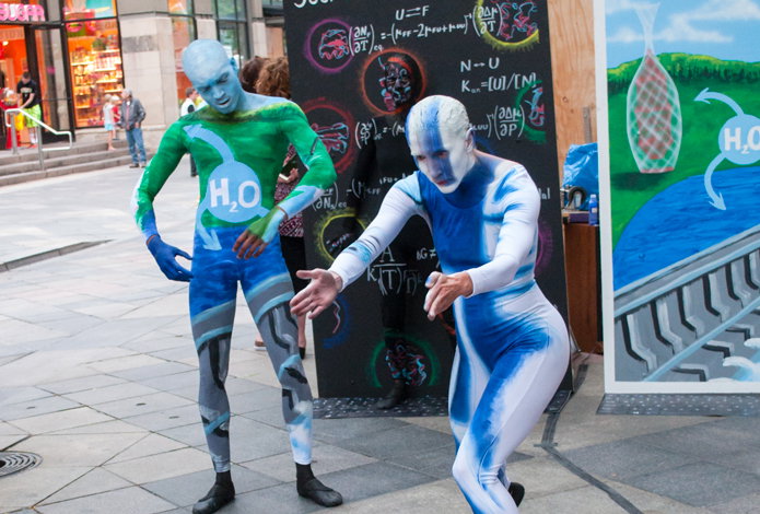Side view of the dancer blending into the Science panel